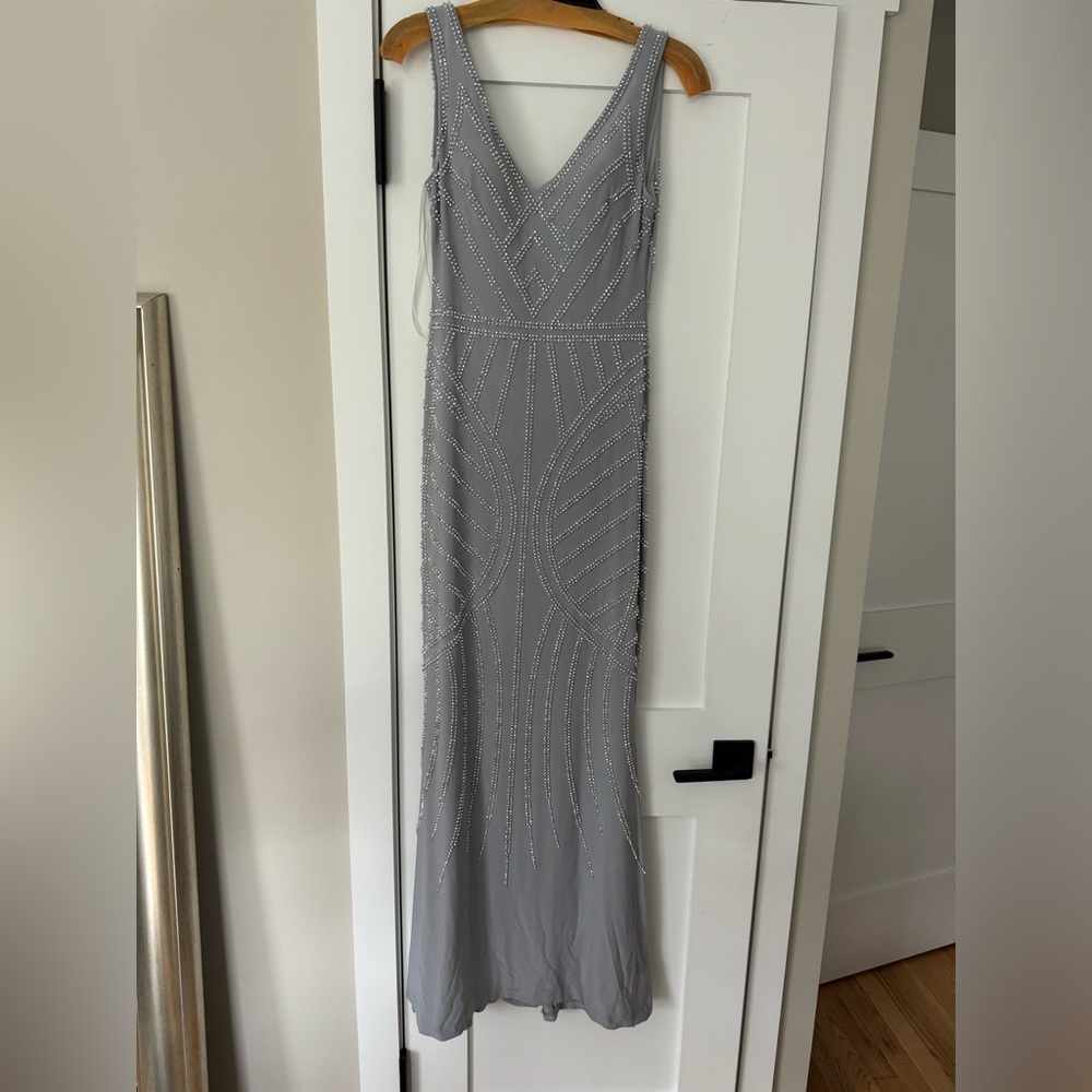 Avery G new condition silver / gray gown with silver beading size 0